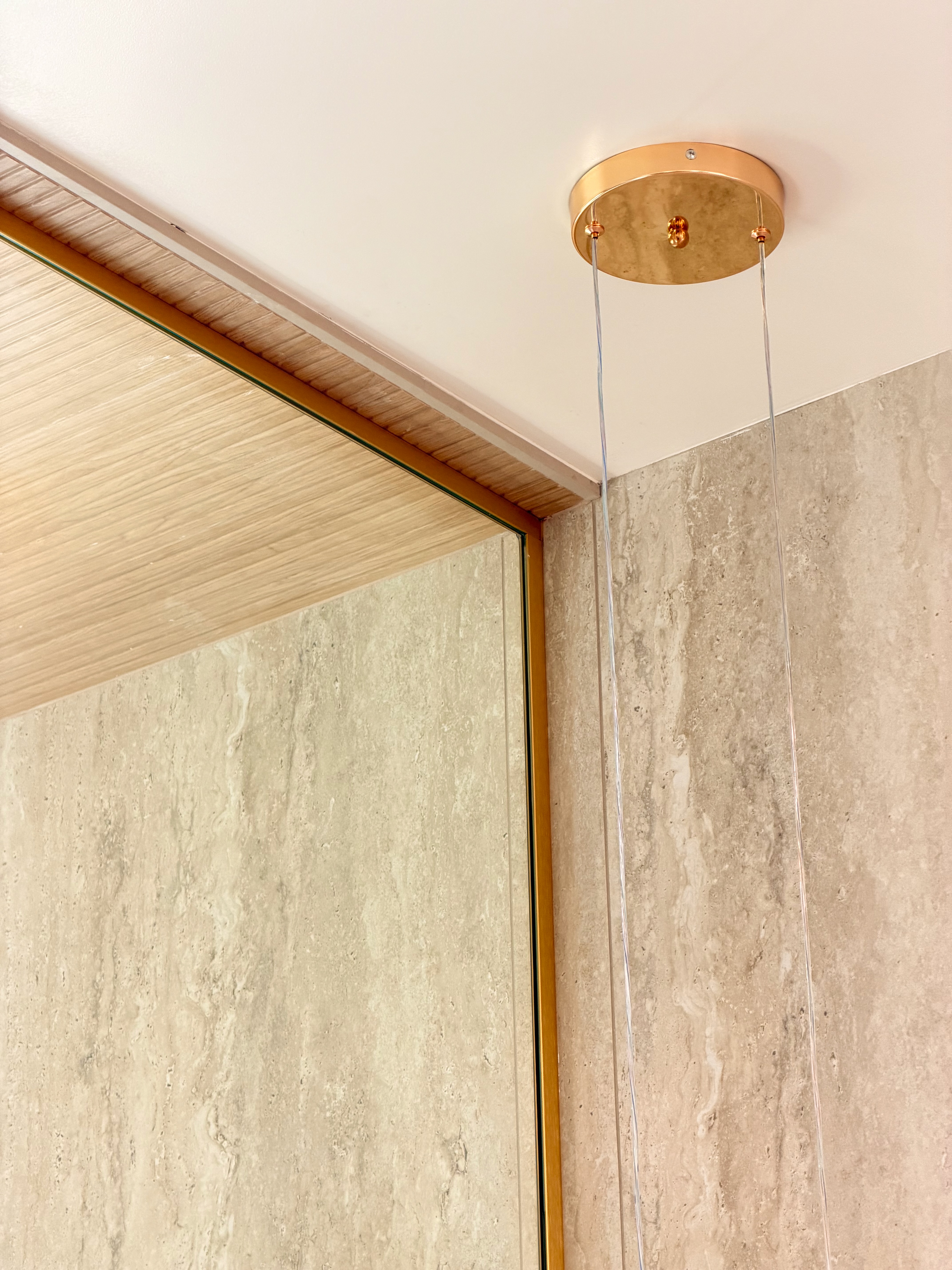 Custom mirror with gold frame detail